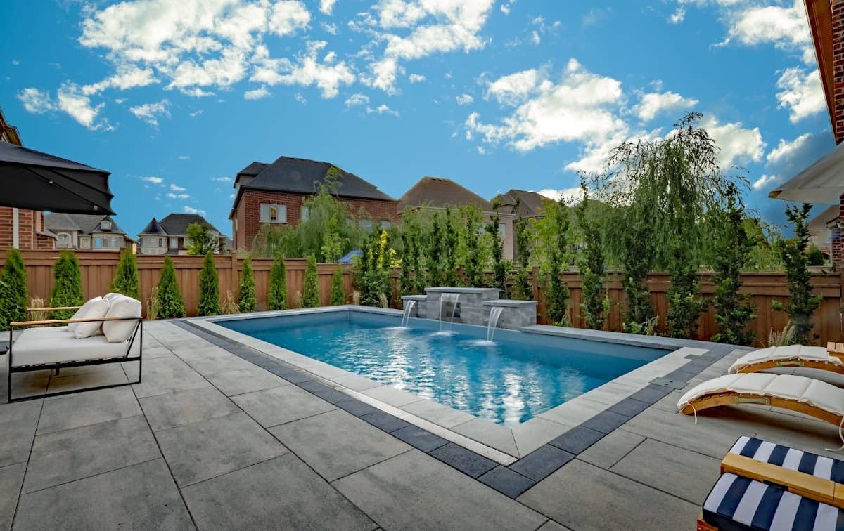 Strong Base Interlock, Landscaping & Pool Installation, photographed at its own listing